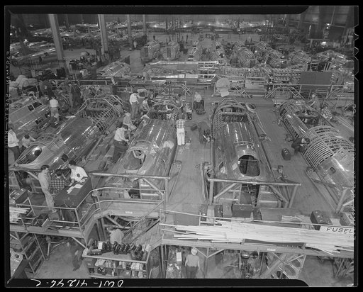 Untitled photo, possibly related to: Boeing aircraft plant, Seattle, Washington. Production of B-17F (Flying Fortress) bombing planes. Fuselage sections.