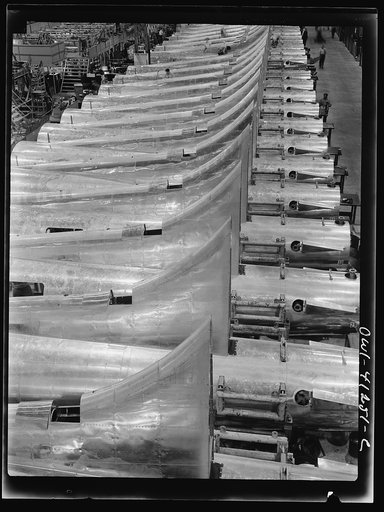 Untitled photo, possibly related to: Boeing aircraft plant, Seattle, Washington. Production of B-17F (Flying Fortress) bombing planes. Tail section of B-17F (Flying Fortress) bombers