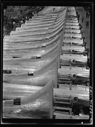 Untitled photo, possibly related to: Boeing aircraft plant, Seattle, Washington. Production of B-17F (Flying Fortress) bombing planes. Tail section of B-17F (Flying Fortress) bombers
