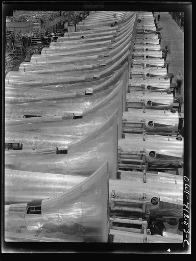 Untitled photo, possibly related to: Boeing aircraft plant, Seattle, Washington. Production of B-17F (Flying Fortress) bombing planes. Tail section of B-17F (Flying Fortress) bombers