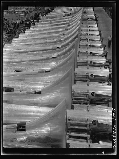 Untitled photo, possibly related to: Boeing aircraft plant, Seattle, Washington. Production of B-17F (Flying Fortress) bombing planes. Tail section of B-17F (Flying Fortress) bombers