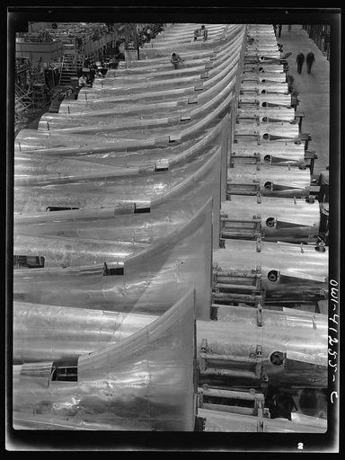 Untitled photo, possibly related to: Boeing aircraft plant, Seattle, Washington. Production of B-17F (Flying Fortress) bombing planes. Tail section of B-17F (Flying Fortress) bombers