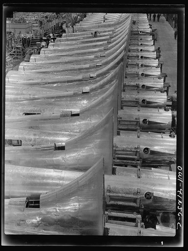Untitled photo, possibly related to: Boeing aircraft plant, Seattle, Washington. Production of B-17F (Flying Fortress) bombing planes. Tail section of B-17F (Flying Fortress) bombers