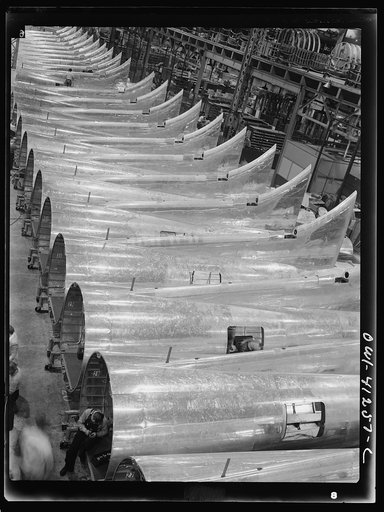Untitled photo, possibly related to: Boeing aircraft plant, Seattle, Washington. Production of B-17F (Flying Fortress) bombing planes. Tail section of B-17F (Flying Fortress) bombers