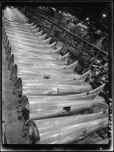 Untitled photo, possibly related to: Boeing aircraft plant, Seattle, Washington. Production of B-17F (Flying Fortress) bombing planes. Tail section of B-17F (Flying Fortress) bombers