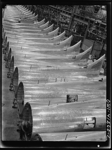 Untitled photo, possibly related to: Boeing aircraft plant, Seattle, Washington. Production of B-17F (Flying Fortress) bombing planes. Tail section of B-17F (Flying Fortress) bombers