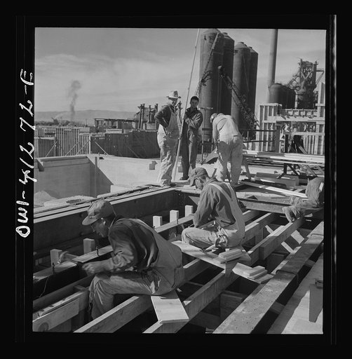 Untitled photo, possibly related to: Bingham Canyon, Utah. Building a trestle bridge at the open-pit mines of the Utah Copper Company