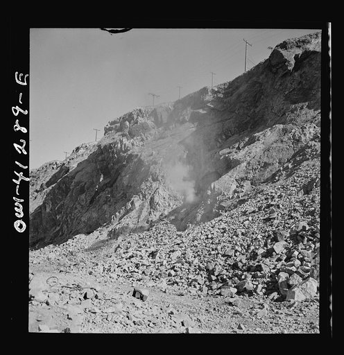 Bingham Canyon, Utah. Blasting at the open-pit mine of the Utah Copper Company