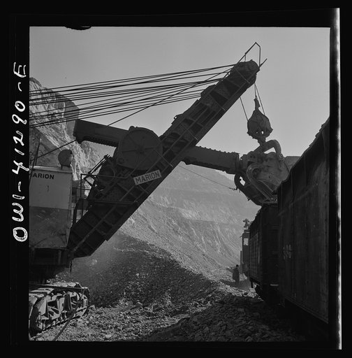 Bingham Canyon, Utah. A huge dipper loading ore into cars at an open-pit mine of the Utah Copper Company