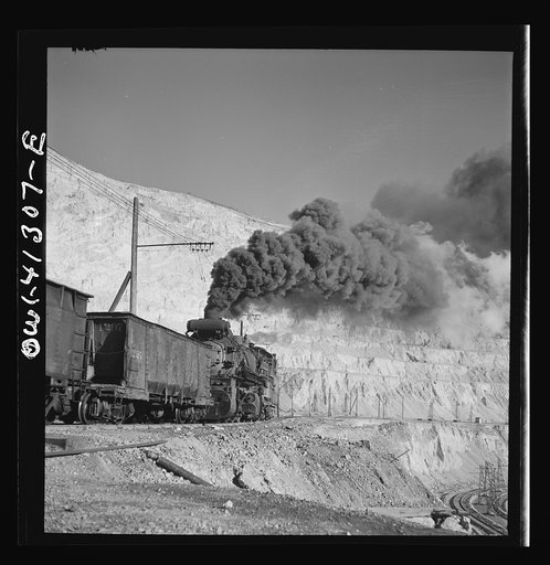 Untitled photo, possibly related to: Bingham Canyon, Utah. Ore train at a mine of the Utah Copper Company