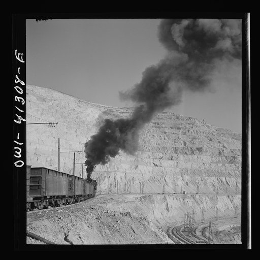 Untitled photo, possibly related to: Bingham Canyon, Utah. Ore train at a mine of the Utah Copper Company