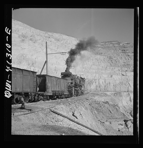 Untitled photo, possibly related to: Bingham Canyon, Utah. Ore train at a mine of the Utah Copper Company