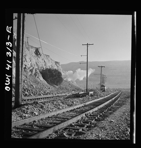 Bingham Canyon, Utah. Blasting at the open-pit mine of the Utah Copper Company