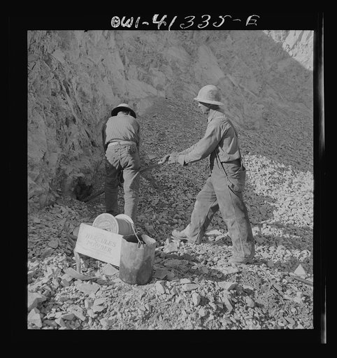 Bingham Canyon, Utah. Temping a blasting charge at the open-pit mine workings of the Utah Copper Company