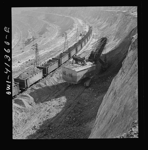 Bingham Canyon, Utah. Loading ore into car at an open-pit of the Utah Copper Company