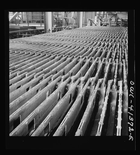 El Paso, Texas, Phelps Dodge refining company. Electrolytic tanks in which sheets of pure copper are formed. The sheets are later melted and cast into ingots