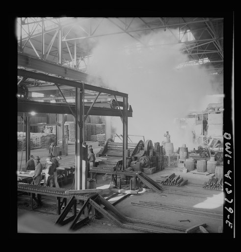 Untitled photo, possibly related to: Phelps Dodge refining company, El Paso Texas. Interior of the plant showing stacks of wire bars