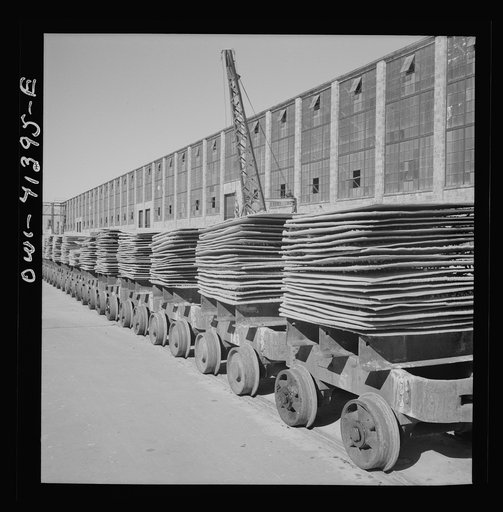 Untitled photo, possibly related to: Phelps Dodge refining company, El Paso, Texas. Copper sheets on conveyors in the loading yards