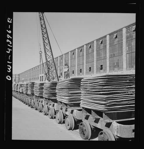 Untitled photo, possibly related to: Phelps Dodge refining company, El Paso, Texas. Copper sheets on conveyors in the loading yards