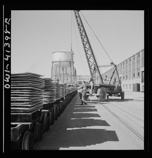 Untitled photo, possibly related to: Phelps Dodge refining company, El Paso, Texas. Copper sheets on conveyors in the loading yards