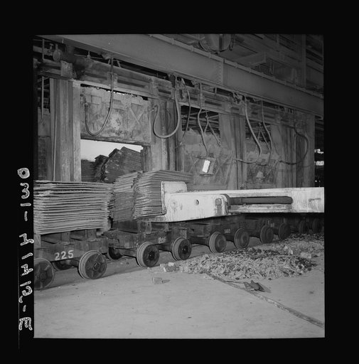 Phelps Dodge refining company, El Paso, Texas. Charging sheets of copper, produced by electrolysis, into a reverbatory furnace