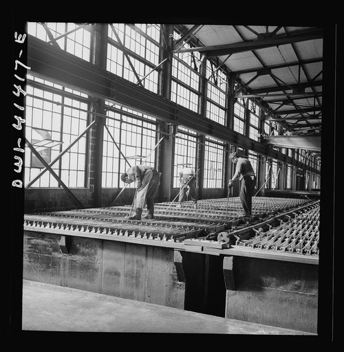 Untitled photo, possibly related to: El Paso, Texas, Phelps Dodge refining company. Electrolytic tanks in which sheets of pure copper are formed. The sheets are later melted and cast into ingots