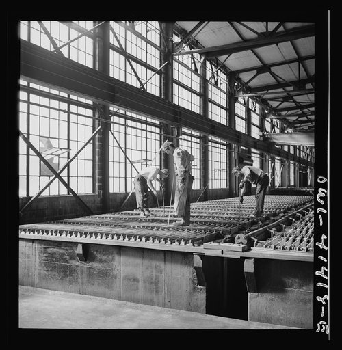 Untitled photo, possibly related to: El Paso, Texas, Phelps Dodge refining company. Electrolytic tanks in which sheets of pure copper are formed. The sheets are later melted and cast into ingots