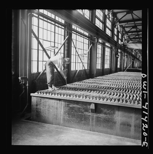 Untitled photo, possibly related to: El Paso, Texas, Phelps Dodge refining company. Electrolytic tanks in which sheets of pure copper are formed. The sheets are later melted and cast into ingots