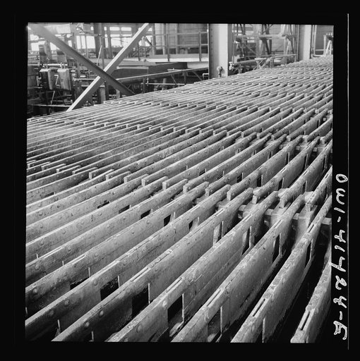 Untitled photo, possibly related to: El Paso, Texas. Phelps Dodge refining company. Sheets of pure copper are formed by electrolysis in large tanks in later melted and poured into ingots