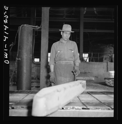 El Paso, Texas. Phelps Dodge refining company. Trimming bars of pure copper