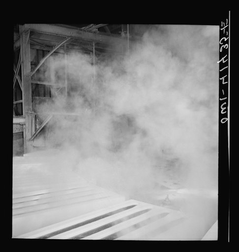 Untitled photo, possibly related to: Phelps Dodge refining company, El Paso, Texas. Casting copper ingots