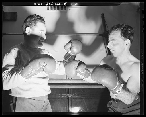 New York, New York. Boxing instructor, Maurice Case, giving instructions to Joe Brun at the Lighthouse, an institution for the blind, at 111 East Fifty-ninth Street