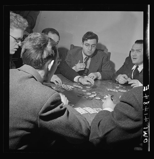 New York, New York. Playing cards (the participants are blind) at the Lighthouse, an institution for the blind, at 111 East Fifty-ninth Street. Note the tiny identification marks on the corners of the cards