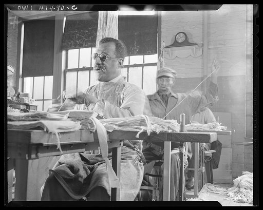 New York, New York. Blind men sewing mops by hand at the Lighthouse, an institution for the blind, at 111 East Fifty-ninth Street