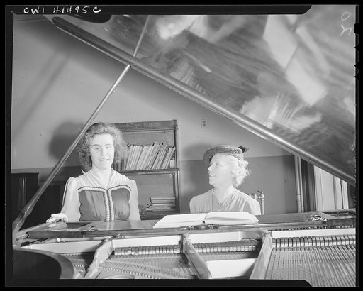 New York, New York. Dorothy Robert taking her singing lesson from Miss Campbell, an instructor at the Lighthouse, an institution for the blind, at 111 East Fifty-ninth Street