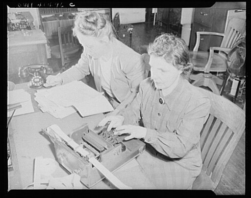 New York, New York. Miss Louise Kintner, head of the Public Relations Department (left) dictating to Ruth Askenas, who is taking it down on a Braille machine at the Lighthouse, an institution for the blind, at 111 East Fifty-ninth Street