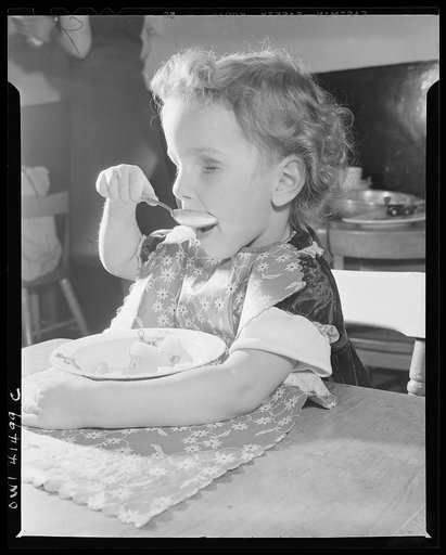 New York, New York. Pauline Nodhturft is now feeding herself at the Lighthouse, an institution for the blind, at 111 East Fifty-ninth Street