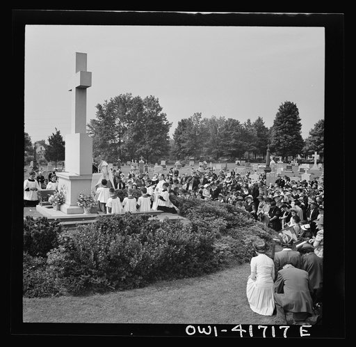 Untitled photo, possibly related to: Southington, Connecticut. On All Soul's Day the Catholic congregation is gathering in the Saint Thomas cemetery for an outdoor Mass which in 1942 was officiated by the Reverend Francis J. Mihalek