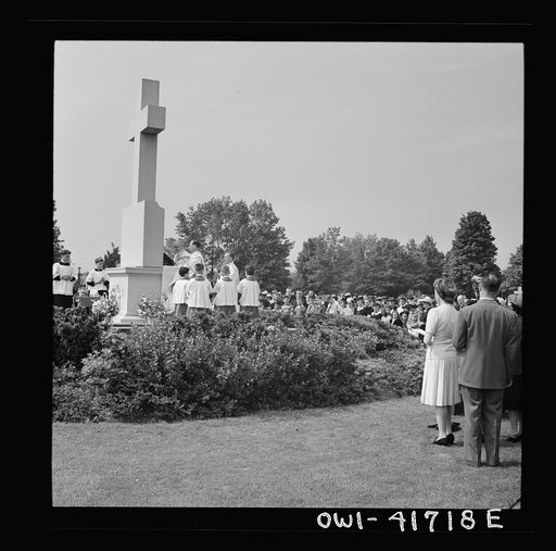 Untitled photo, possibly related to: Southington, Connecticut. On All Soul's Day the Catholic congregation is gathering in the Saint Thomas cemetery for an outdoor Mass which in 1942 was officiated by the Reverend Francis J. Mihalek