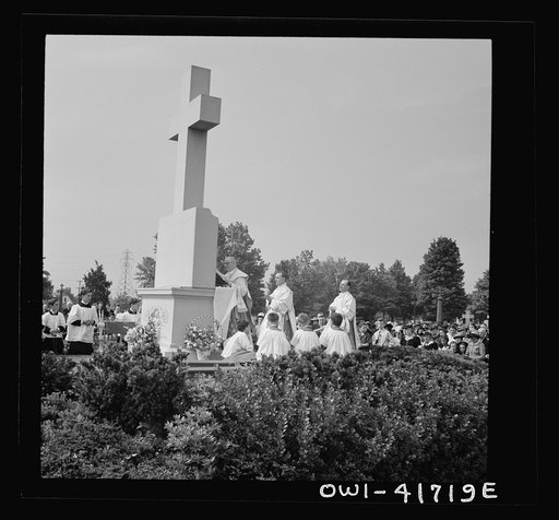 Southington, Connecticut. On All Soul's Day the Catholic congregation is gathering in the Saint Thomas cemetery for an outdoor Mass which in 1942 was officiated by the Reverend Francis J. Mihalek