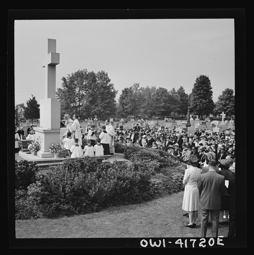 Untitled photo, possibly related to: Southington, Connecticut. On All Soul's Day the Catholic congregation is gathering in the Saint Thomas cemetery for an outdoor Mass which in 1942 was officiated by the Reverend Francis J. Mihalek