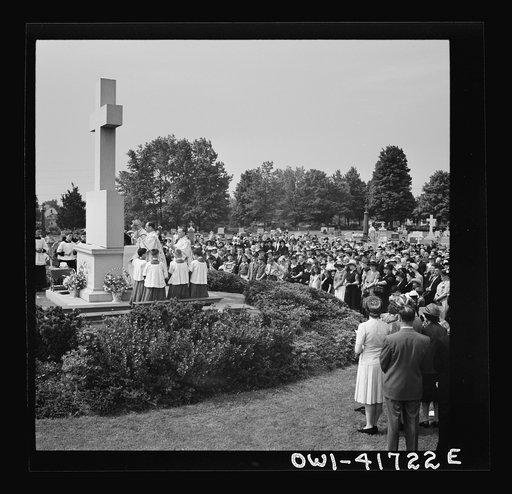 Untitled photo, possibly related to: Southington, Connecticut. On All Soul's Day the Catholic congregation is gathering in the Saint Thomas cemetery for an outdoor Mass which in 1942 was officiated by the Reverend Francis J. Mihalek