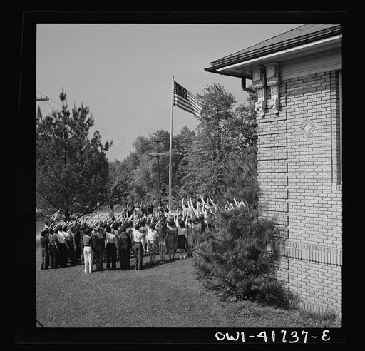 Untitled photo, possibly related to: Southington, Connecticut. School children pledging their allegiance to the flag