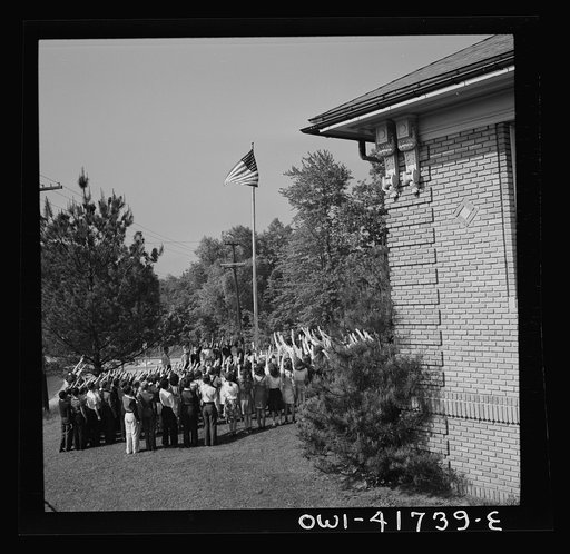 Untitled photo, possibly related to: Southington, Connecticut. School children pledging their allegiance to the flag