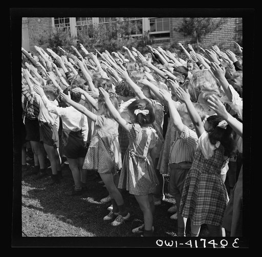 Untitled photo, possibly related to: Southington, Connecticut. School children pledging their allegiance to the flag