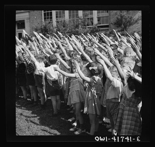 Untitled photo, possibly related to: Southington, Connecticut. School children pledging their allegiance to the flag