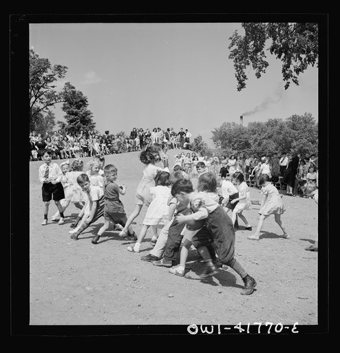 Southington, Connecticut. At Beecher Street School, whose student body consists half of Americans of Italian descent and half of Americans of Polish descent. The Queen of May was Emily Shuvak, of Polish extraction; the King, Philip D'Agostino, of Italian
