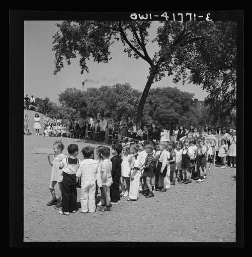 Southington, Connecticut. At Beecher Street School, whose student body consists half of Americans of Italian descent and half of Americans of Polish descent. The Queen of May was Emily Shuvak, of Polish extraction; the King, Philip D'Agostino, of Italian
