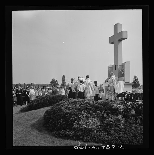 Southington, Connecticut. On All Soul's Day the Catholic congregation is gathering in the Saint Thomas cemetery for an outdoor Mass which in 1942 was officiated by the Reverend Francis J. Mihalek