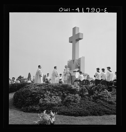 Southington, Connecticut. An American town and its way of life.  On Memorial day the Catholic congregation is gathering in the Saint Thomas cemetery for an outdoor Mass which in 1942 was officated by the Reverend Francis J. Mihalek